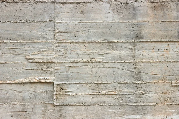 ahşap kalıp arka plan olarak bir ham beton duvara damgalı dokusuna. 