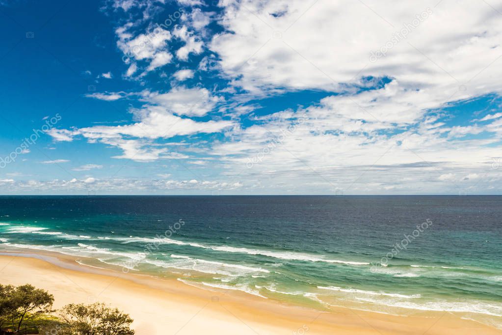 Landscape of the sea, blue sky, sandy beach in the Gold Coast Australia