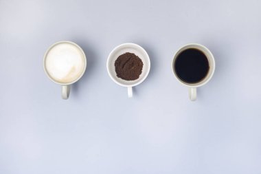 Kahve fincanı ürün yelpazesine CAPUCINO fincan ile fincan Espresso fincan kahve üst zemin göster mavi arka plan