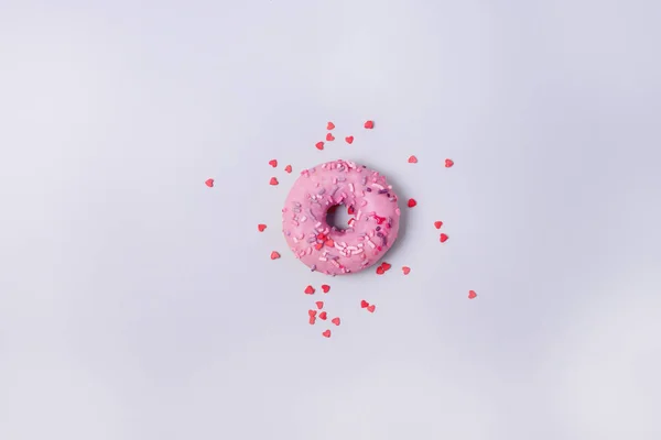 Een Donut Met Suikerglazuur Pastel Roze Blauwe Achtergrond Zoete Lekkere — Stockfoto