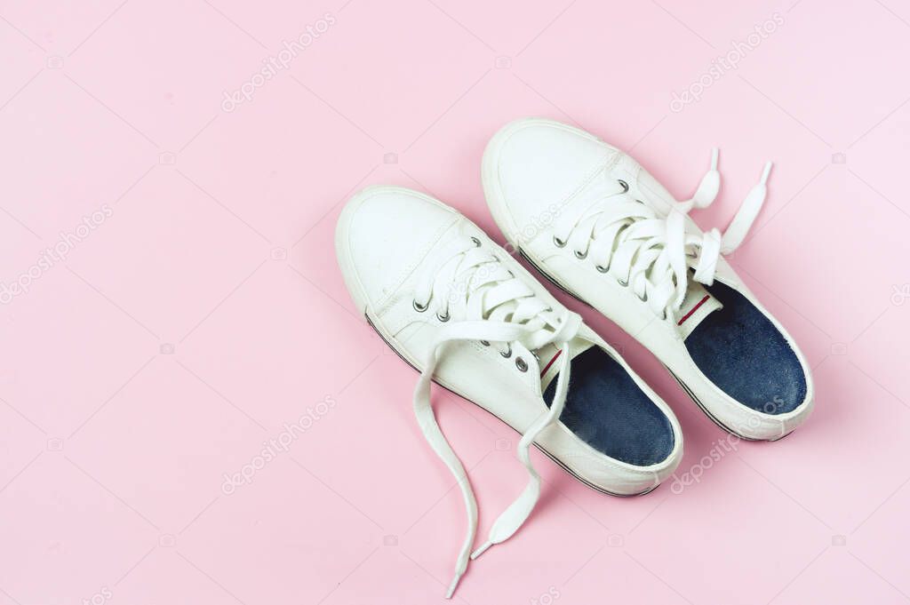 Lovely Women White Sneakers White Sport Shoes Pink Background Top View Copy Space