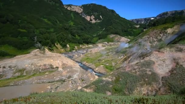 Valley of Geysers. Tourist season in Kamchatka Peninsula. Kronotsky Nature Reserve. The summer stock footage video — Stock Video