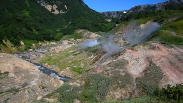 Valley of Geysers. Tourist season in Kamchatka Peninsula. Kronotsky Nature Reserve. The summer stock footage video — Stock Video