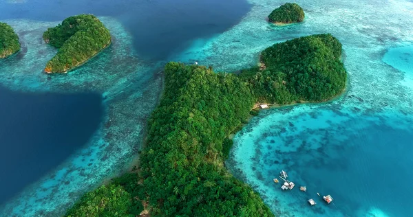 Aerial view of Sugba lagoon. Beautiful landscape with blue sea lagoon, National Park, Siargao Island, Philippines.
