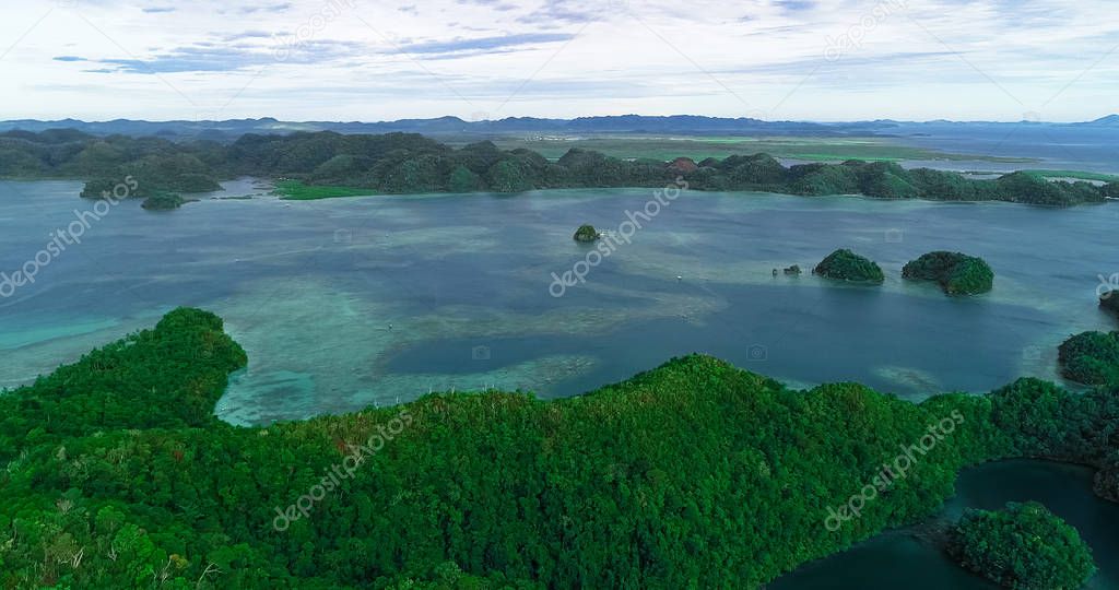 Aerial view of Sugba lagoon. Beautiful landscape with blue sea lagoon, National Park, Siargao Island, Philippines.