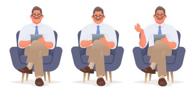 İşadamı veya danışman bir tablet ile bir sandalyede oturuyor