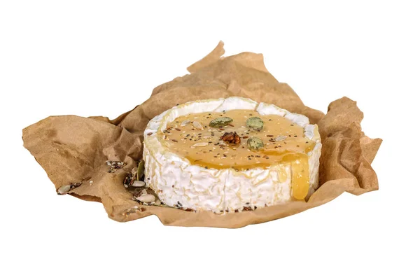 Kawałek Camembert Miodem Nasiona Białym Tle Papier Pakowy — Zdjęcie stockowe