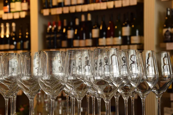 Row of wine glasses for party. Elegant empty row of wine glasses
