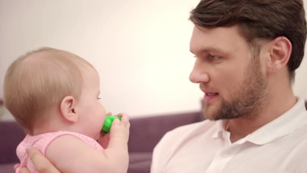 Bearded daddy kissing baby infant. Father kissing baby. Happy man with baby — Stock Video