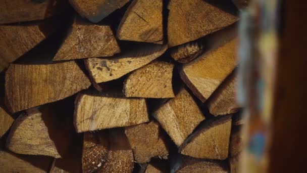 Stacks of firewood for heating house. Close up preparation of firewood — Stock Video