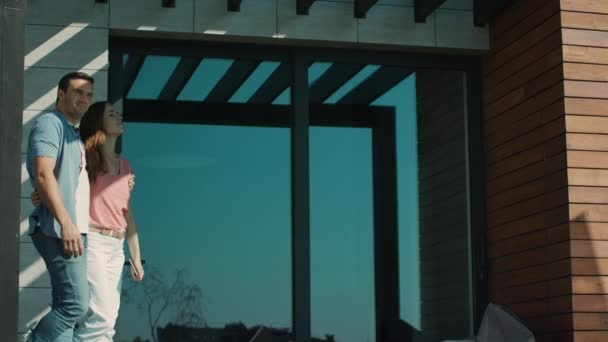 Couple walking on terrace. Beautiful family talking on terrace in slow motion. — Stock Footage Couple walking on terrace. Beautiful family talking on terrace in slow motion. Stock Video