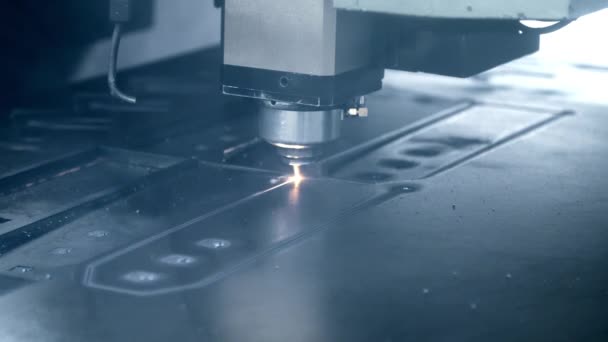 Process of industrial laser cutting of sheet metal. Metalworking in workshop — Stock Video