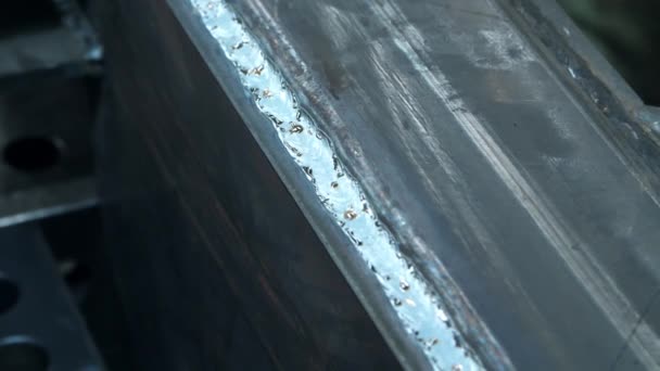 Close up of metallic surface after weld influence. Iron with traces of welding — Stock Video