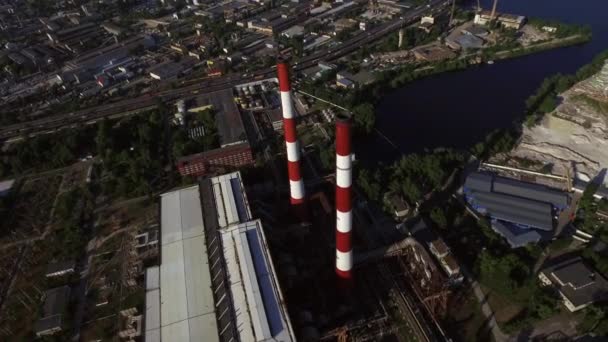 Chimney on industrial plant in city. Aerial view industrial pipe on factory area — Stock Video