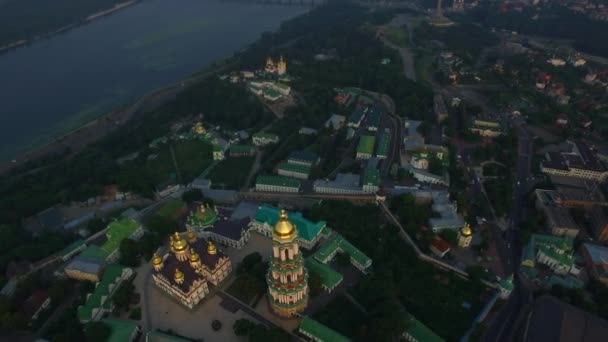 Bell tower Kiev Pechersk Lavra on Dnieper shore from drone above — Stock Video