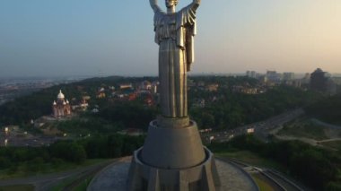Drone view Mother Motherland statue in Kiev city. Memorial park Victory Day