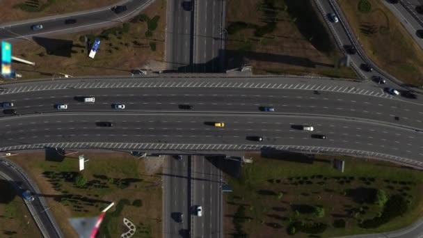 Cars traffic on highway road. Aerial view car moving on freeway interchange — Stock Video