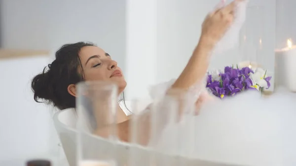 Closeup smiling woman washing hands with foam. Sexy woman relaxing bath — Stock Photo, Image