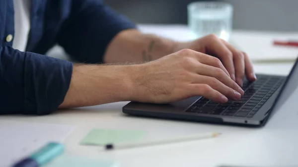 Close up man hands working laptop computer. Male professional typing computer — Zdjęcie stockowe