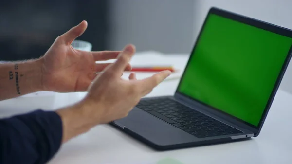 Closeup businessman talking on video conference. Man looking green screen laptop — Stock Photo, Image