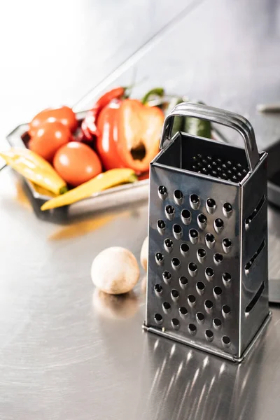 Kitchen Utensils Grater For Vegetables On White Background Stock Photo,  Picture and Royalty Free Image. Image 120239961.