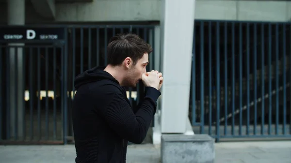 Male boxer training box punch on workout. Close up young man boxing outdoor. — Stockfoto