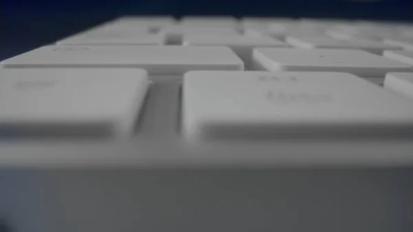 Macro of modern white keyboard of computer. White computer keyboard. — Stock Photo, Image