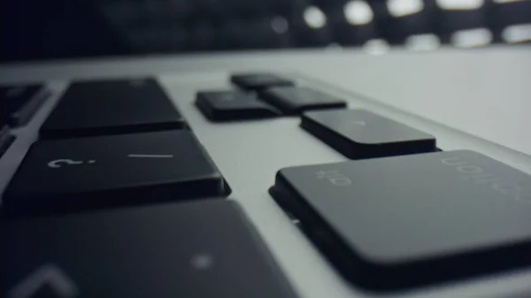 Laptop computer keyboard with black keys. Buttons of laptop keyboard in detail — Stock Photo, Image