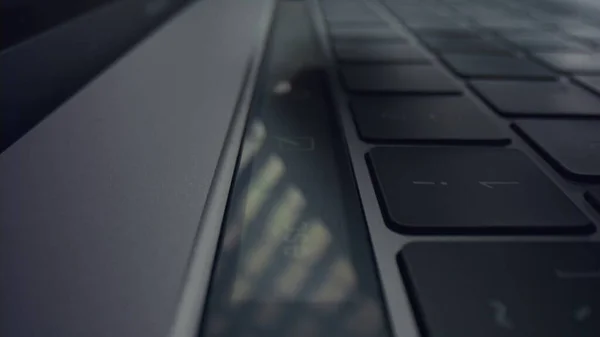 Male fingers pressing touch buttons on laptop.Man hand using touch bar on laptop — Stock Photo, Image