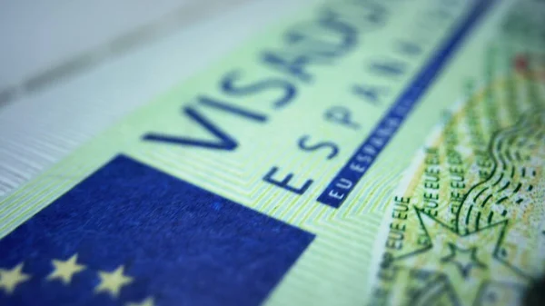 Biometrisk pass med spansk visum. Schengenvisum for turisme og reiser i EU stockbilde