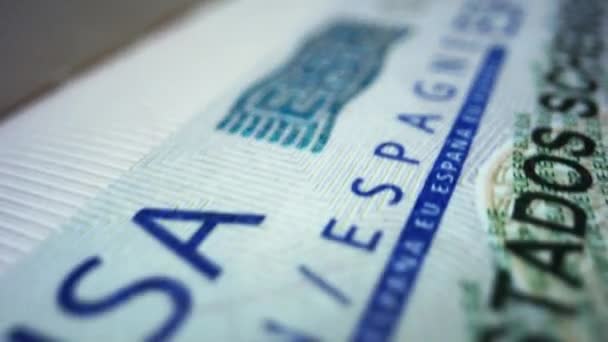 Spanish visa in foreign passport. Schengen visa in document. Travelling concept — Stock Video