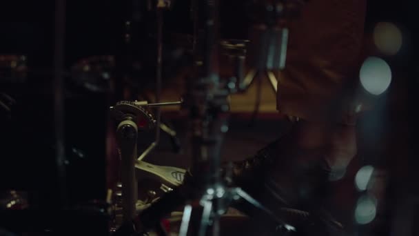 Closeup drum pedal in action in concert hall. Musician using drum set indoor. — Stock Video