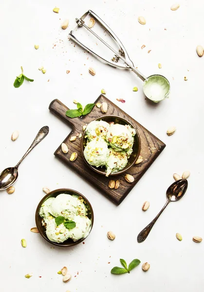 Pistachio Ice Cream Nuts Decorated Mint Leaves Brown Bowls Light — Stock Photo, Image