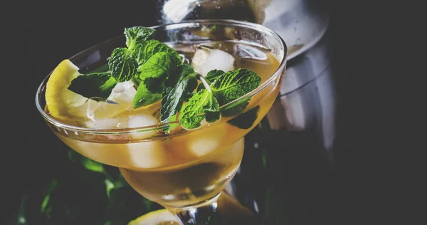 Alcoholic cocktail daiquiri with lemon and mint