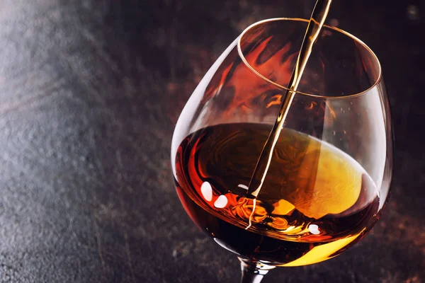 Cognac Pour Glass Vintage Brown Background Selective Focus — Stock Photo, Image
