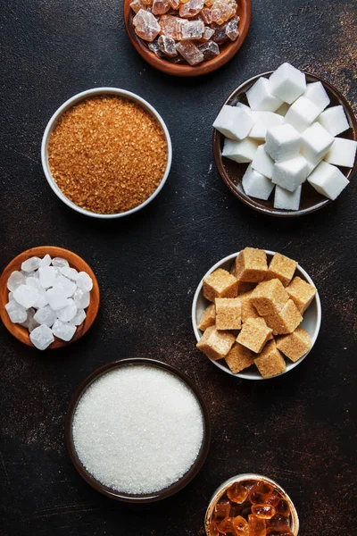 Set Different White Brown Sugar Assortment Dark Background Top View — Stock Photo, Image