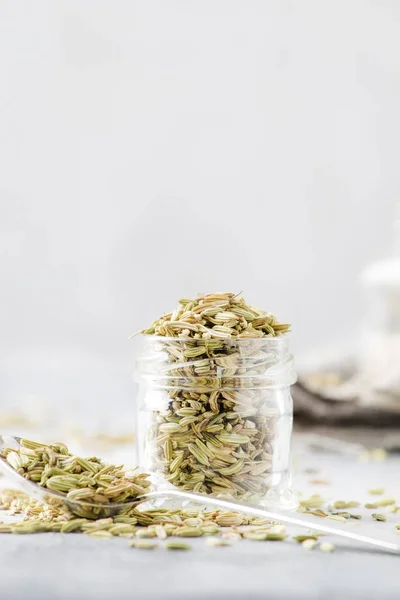 Fennel Seeds Small Glass Jar Silver Metal Spoon Gray Kitchen — Stock Photo, Image