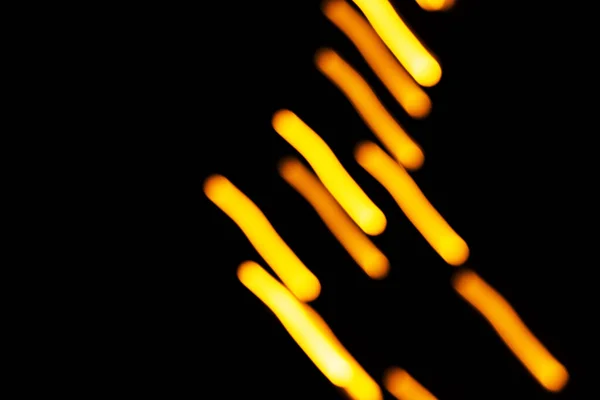 Blurred Moving Fire Lights Background Yellow Orange White Colors Black — Stock Photo, Image