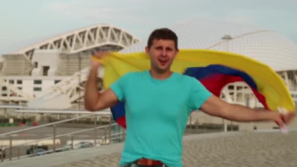 Male fan with the flag of Colombia. — Stock Video