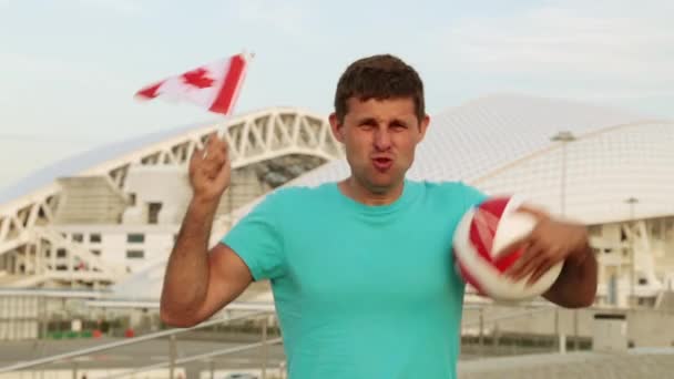 Abanico de fútbol con la bandera de Canada — Vídeos de Stock