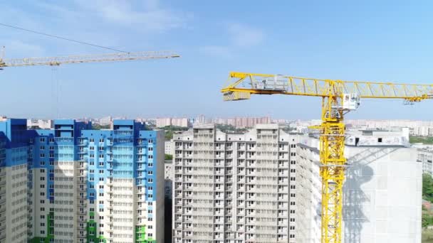 Construction crane. City, building crane, aerial view. — Stock Video