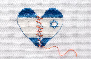 Embroider the broken heart of the colors of the flag of Israel sewed with red threads. Heart surgery. clipart