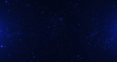 Işık parçacıklarıyla dolu yıldızlı bir alanı tasvir eden büyüleyici bir derin mavi arka plan evrenin engin ve gizemli özünü yakalıyor..