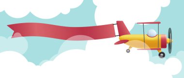 Sancaklı uçak bulutların arasında uçuyor