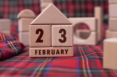 23 Şubat Tahta bloklarla yazılmış