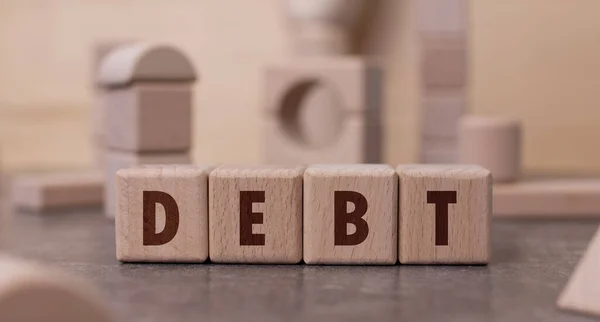 Слово Debt Написане Дерев Яними Блоками — стокове фото