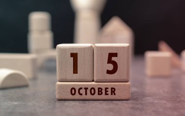 15 Ekim tahta bloklarla yazılmış