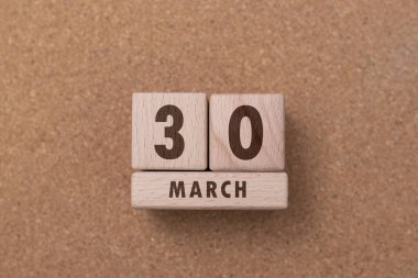 30 Mart Tahta bloklarla yazılmış