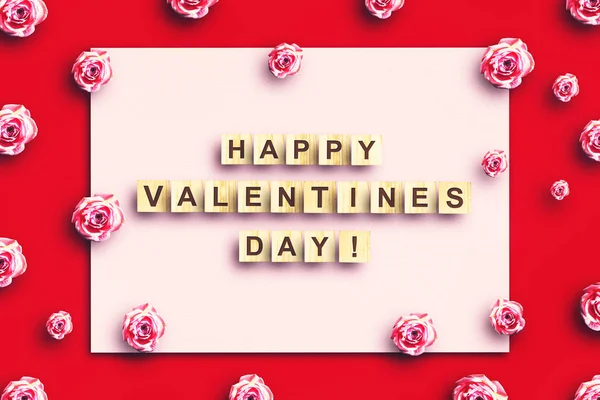 Happy Valentines Day, the inscription on the wooden cubes. On a red background with pink roses. Greeting card. — Stock Photo, Image