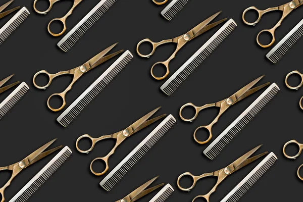Barbershop background. Hairdressing scissors and a hairbrush on a dark background. Beauty and fashion background.